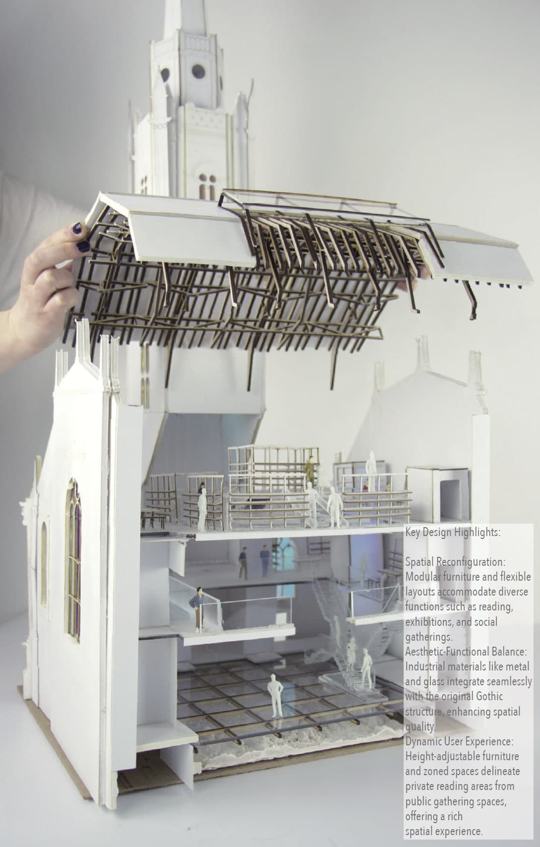 Sectional model with the timber roof canopy lifted away by hand, exposing three inserted floors of frames, figures, and glass stairs inside the kirk