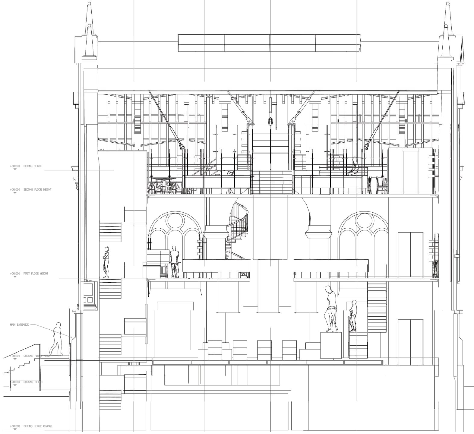 Long section through the kirk — Gothic arcade and rose windows kept intact while new floors, spiral stair, and roof-hung rigging thread through the nave